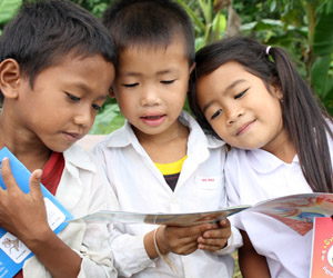 Kids in Laos reading books
